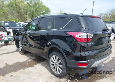 2017 Ford Escape Titanium z USA, uszkodzony, nr VIN 1FMCU9JD4HUE95391